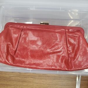 Red leather clutch